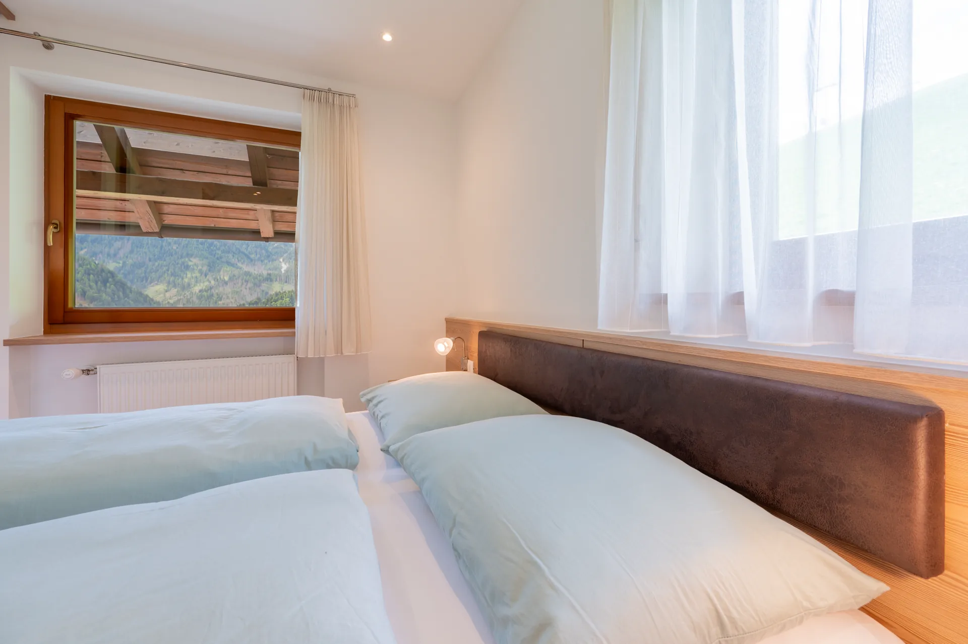 Schlafzimmer im Apartment Bergblick